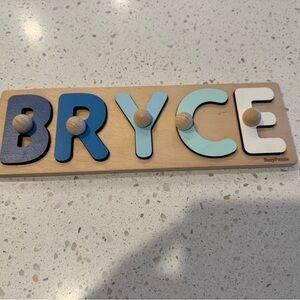 Bryce Wooden Name Puzzle with Blue and White Letters